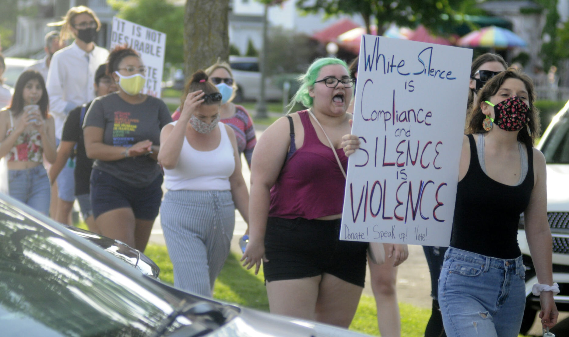 Protesters march on Geneva Street